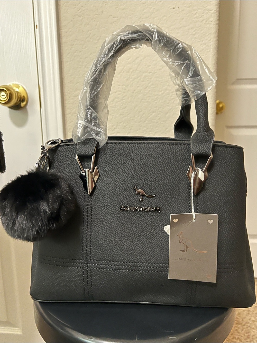 Shu Uemura Black Pebbled Satchel with Pom-Pom Charm